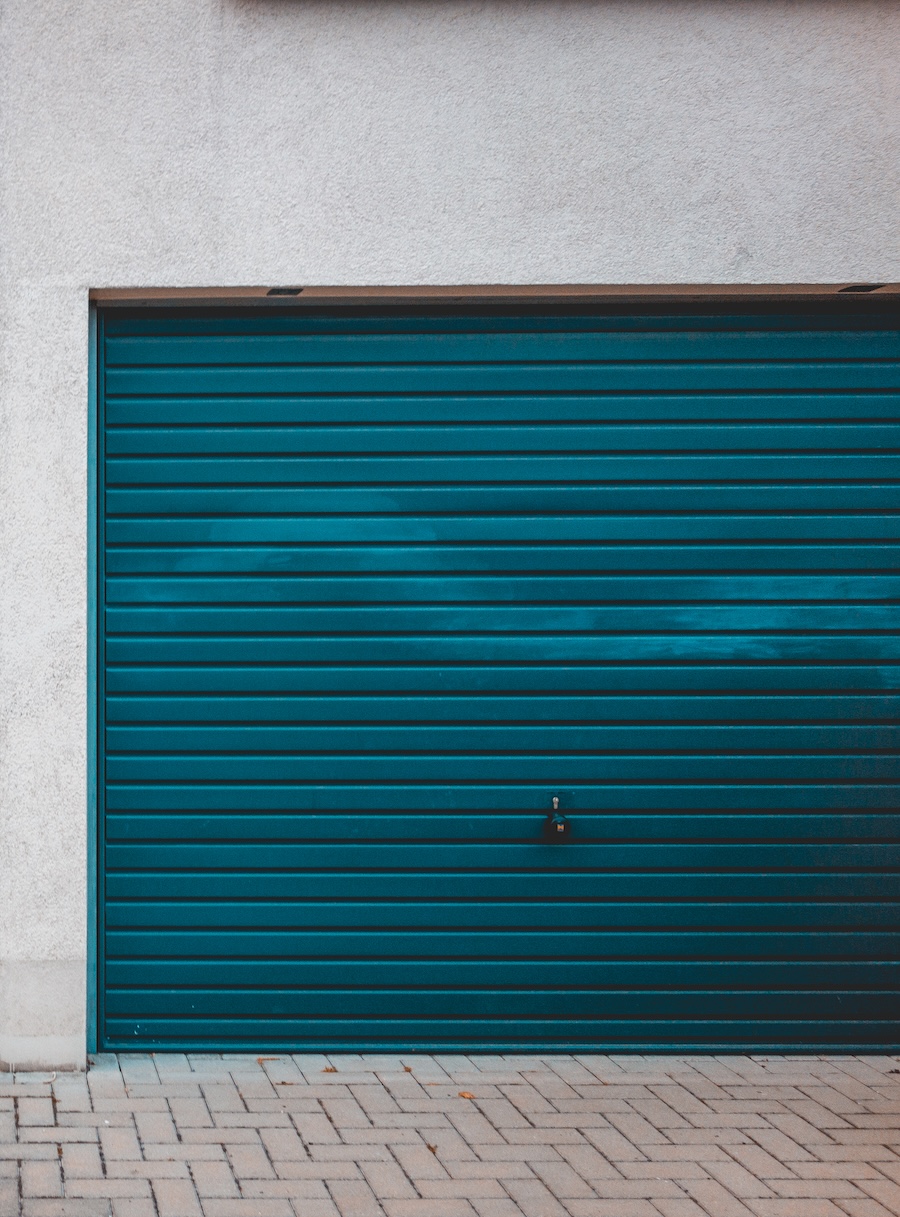 Garage Doors in Suburban Setting on Brick Pavement