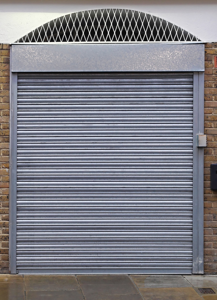 Metal Garage Door on a Brick Building