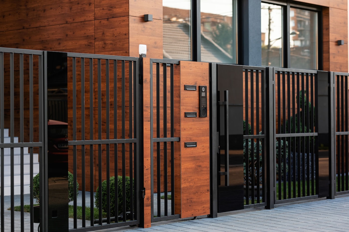 Modern House with Black Metal Fence and Gate